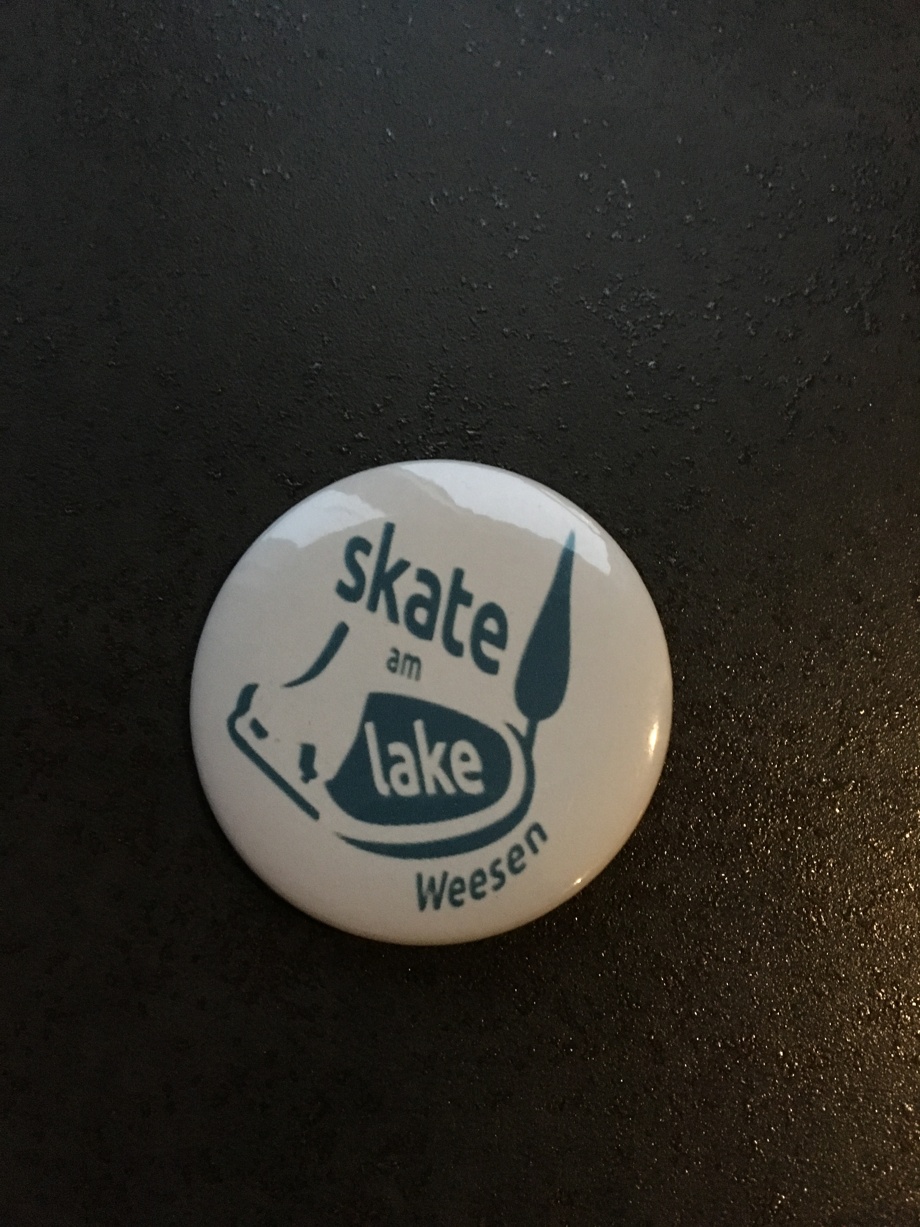 Button mit Logo Skate am Lake