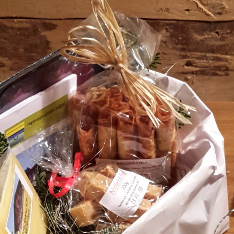 1 Päckli "Güetzi" oder "Brätzeli" oder "Nidletäfeli"