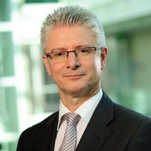 Christian Brunier, Directeur de SIG et parrain de l'École Vivante